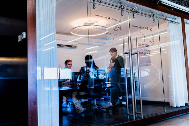 istock Coworkers talking during meeting at offfice 2161809996