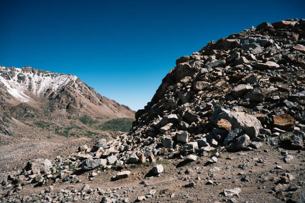 Dirt off-road way through mountain pass top