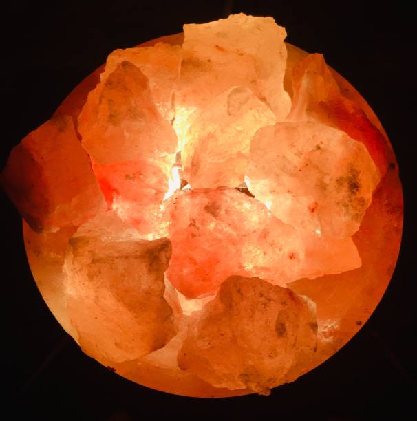 Using the orange glow of a salt lamp as a focus on wellbeing, relaxation and co creation during a meditation retreat