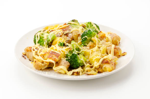 istock Baked potatoes and broccoli with mayonnaise dressing 2161838776