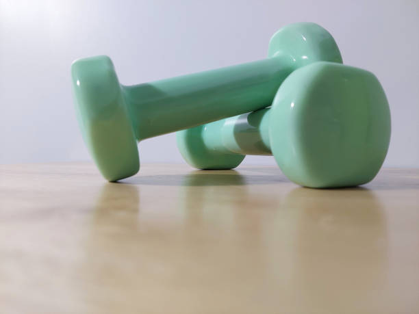 istock A pair of one-kilogram green dumbbells. 2161839063