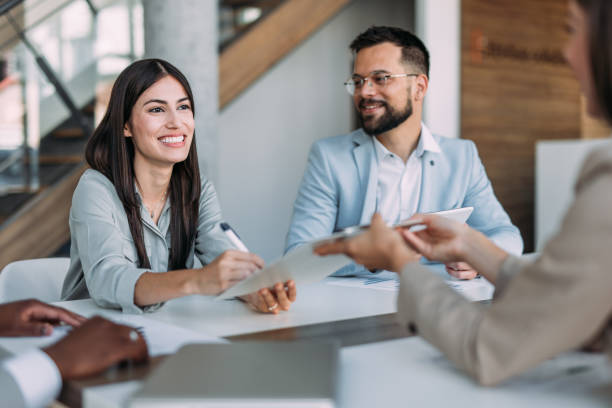 istock Business people signing a contract in the office. 2161842555