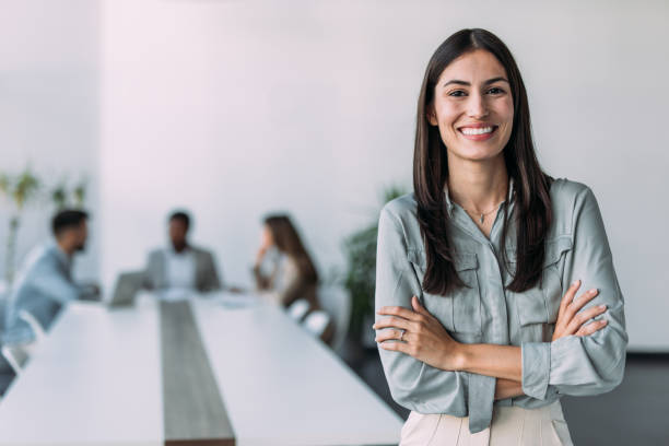 istock Confident businesswoman and her team. 2161842580