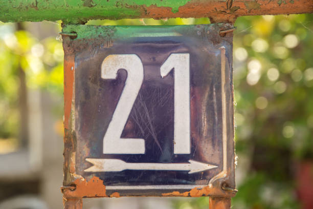istock Enameled plate with number 21 2161842719