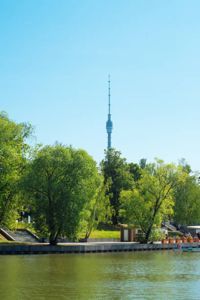 istock A tall tower is visible in the distance, with trees in the foreground 2161843585
