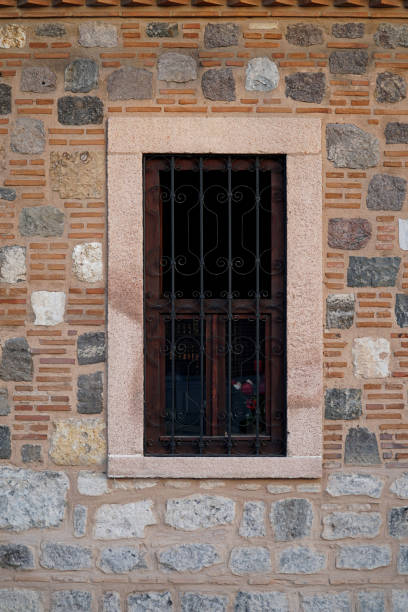 istock old stone brick building and window 2161851534
