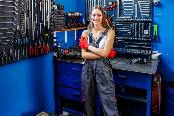 istock Portrait of a Young Woman Auto Servicer with Work Tools. 2161853680