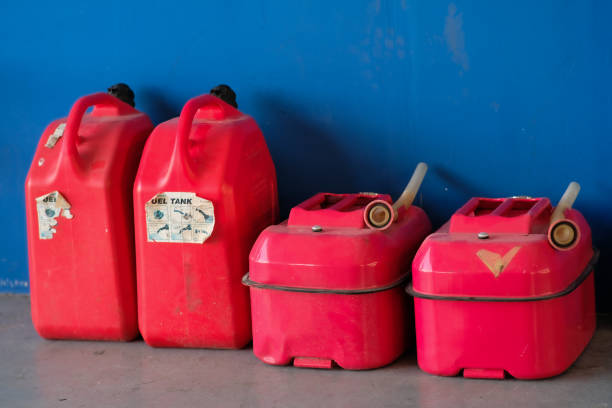 istock Gasoline containers by the blue wall. 2161855161