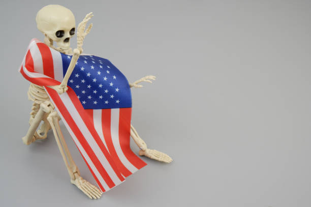 Skeleton with on United States flag.