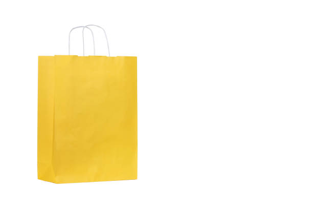 istock Bright and Cheerful: A Yellow Paper Bag with Handles 2161857770