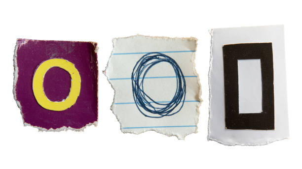 istock O or 0 alphabet torn from a magazine paper 2161858307