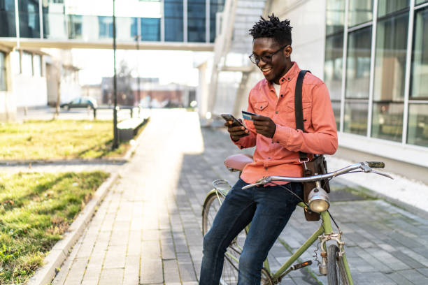 istock Young man making online purchases on smartphone 2161860382