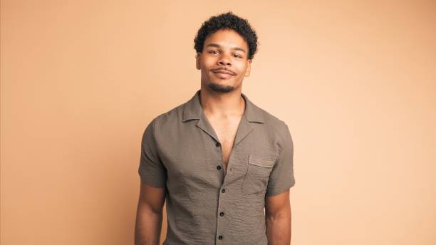 istock Positive man standing with satisfied expression on face 2161860991