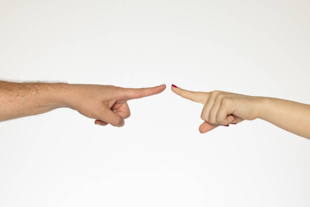 istock woman and man hands finger touching 2161862073