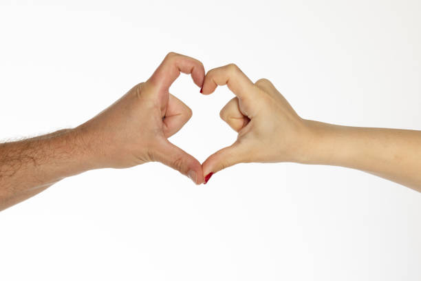 istock Man and woman hands making heart 2161862115