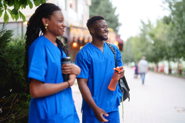istock Healthcare Workers leaving clinic. 2161870286