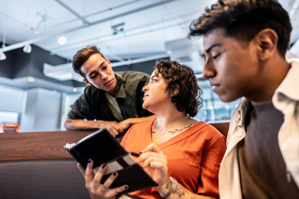 istock Young trainee business people during a meeting at office 2161870847