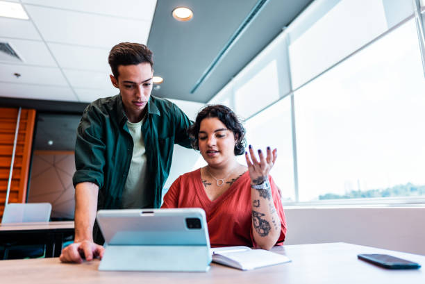 istock Young coworkers working at office 2161871187