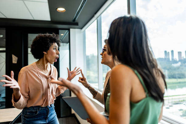 Anger coworkers during a meeting at office