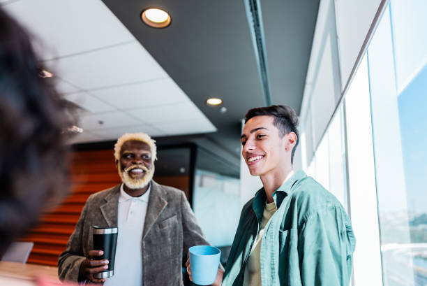 istock Coworkers talking on the office 2161871483