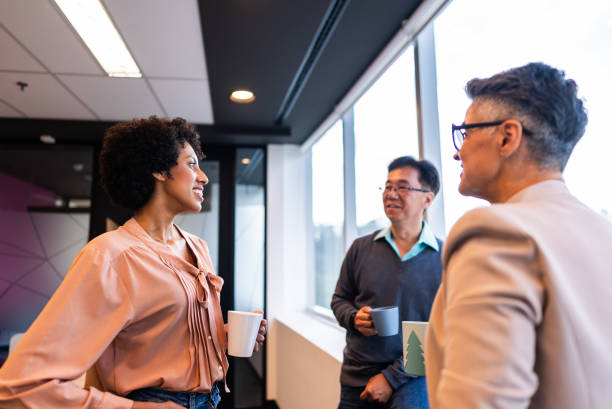 istock Coworkers talking on the office 2161872714