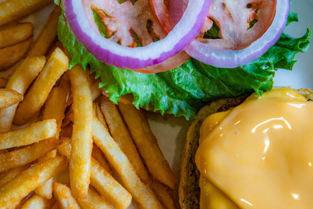 The Guacamole Bacon Burger with Lettuce, Tomato, Red Onion, Cheese and Fries-Photographed on Hasselblad H3D2-39mb Camera