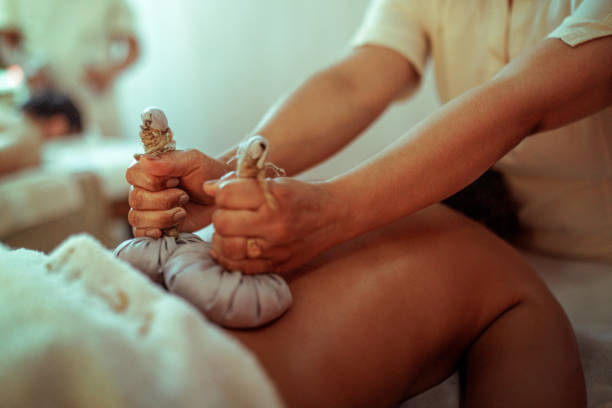 Hot herbal ball spa massage body treatment