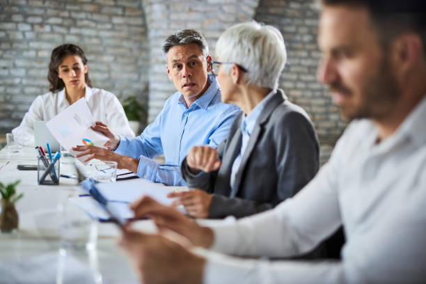 istock Entrepreneur talking about reports on a meeting. 2161887949