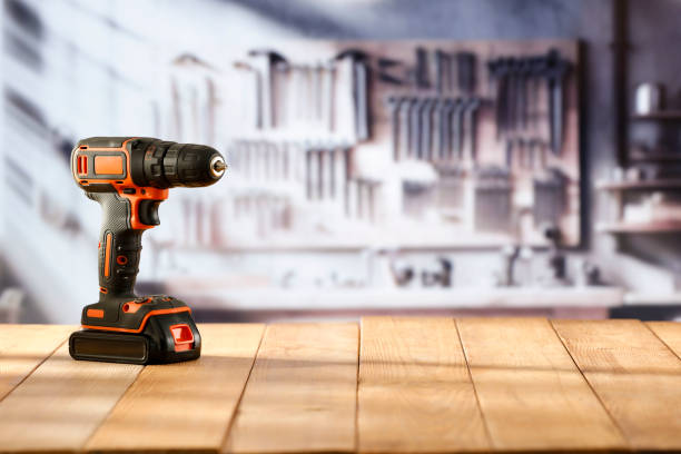 istock A mechanical cordless  screwdriver on a wooden workbench in a craftsman's workshop. 2161890441
