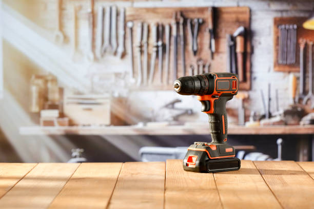 istock A mechanical cordless  screwdriver on a wooden workbench in a craftsman's workshop. 2161890443