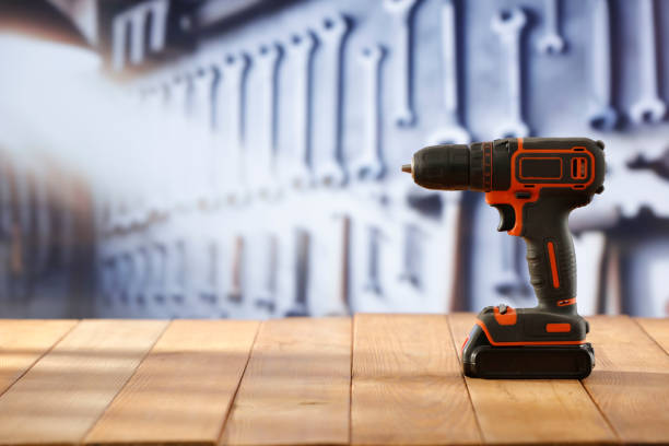 istock A mechanical cordless  screwdriver on a wooden workbench in a craftsman's workshop. 2161890454