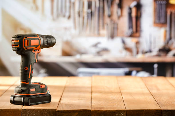 istock A mechanical cordless  screwdriver on a wooden workbench in a craftsman's workshop. 2161890456