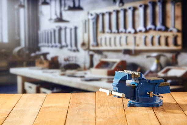 istock Mechanic bench vice on a wooden workbench in a craftsman's workshop. 2161890754