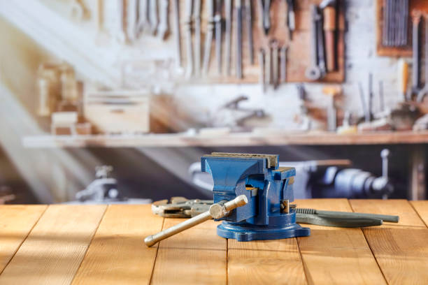 istock Mechanic bench vice on a wooden workbench in a craftsman's workshop. 2161890774