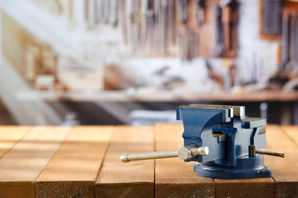 istock Mechanic bench vice on a wooden workbench in a craftsman's workshop. 2161890788