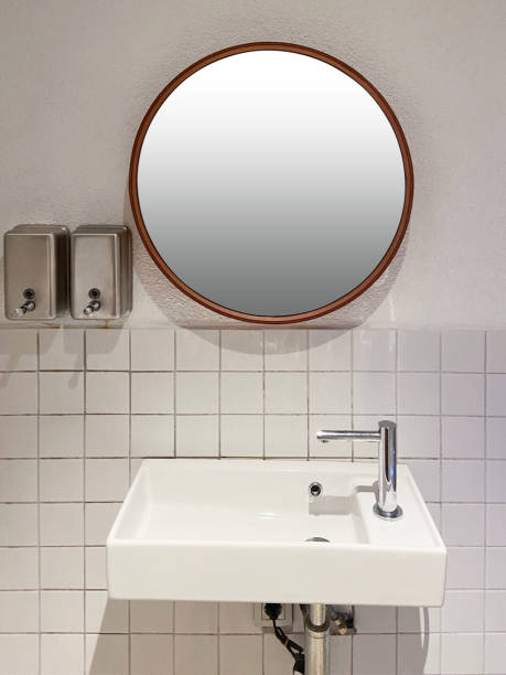 istock Mirror hanging on the wall (Frame with Clipping Path). Bathroom 2161891583