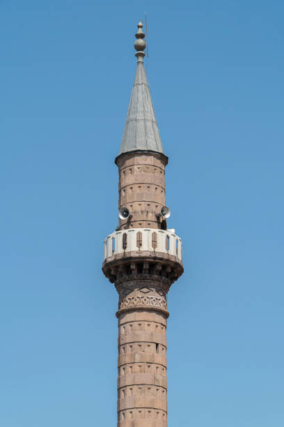 istock blue sky and mosque minaret 2161892617