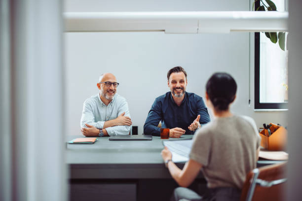 Two Men Conducting a Job Interview in a Modern Office