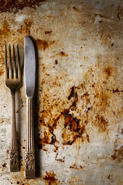 istock Cutlery on dirty oven aluminum baking tray at kitchen 2161896602