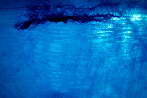 Macro shot of blue marbled vinyl record. Surface of an old vinyl record. Shallow depth of field.