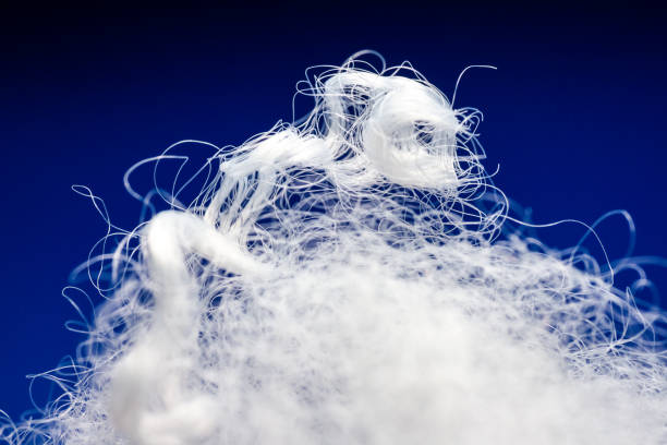istock Extreme macro of polyester stable fiber on blue background 2161896856