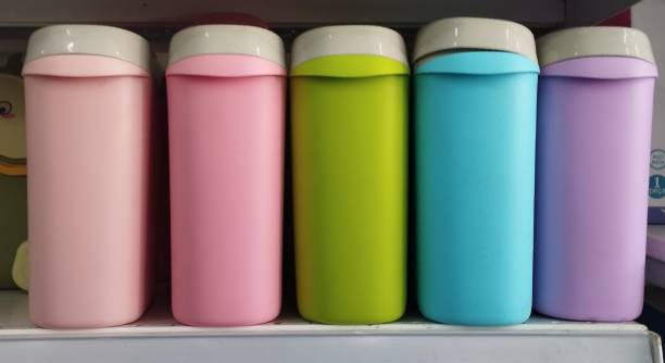 istock Kitchen sink trash can in bright and varied colors 2161897669