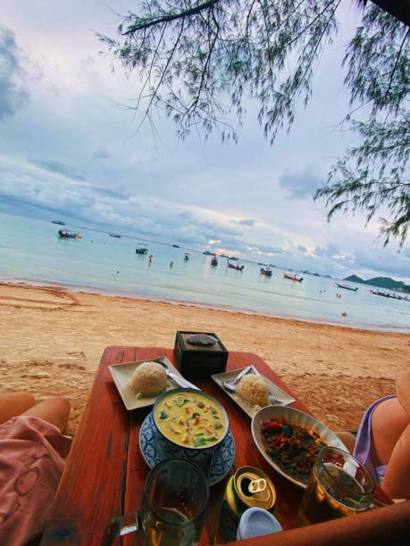 istock Boat watching and Thai breakfast by the beach. 2161902553