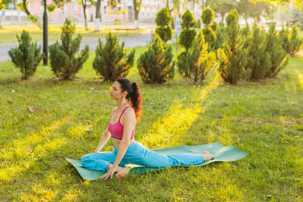 istock Active lifestyle. Yoga in park. 2161903319