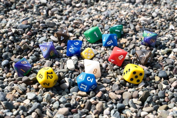 istock Colorful dice on the beach. Selective focus on dice. 2161904957