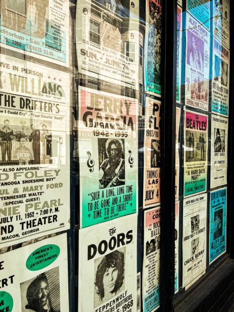Retro posters of various stars and concerts placed on the store window in San Francisco. The history of pop and rock music is in this posters. Nice for a wallpaper and plenty place for copy.