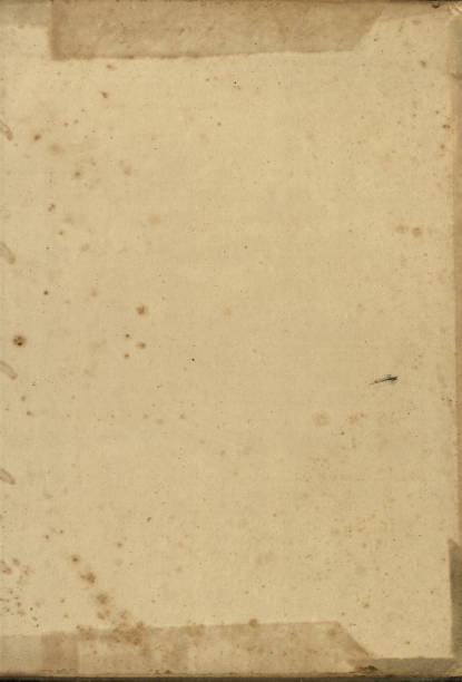 istock Old faded yellowed paper background texture, stained, orginal 150 years old 2161912895