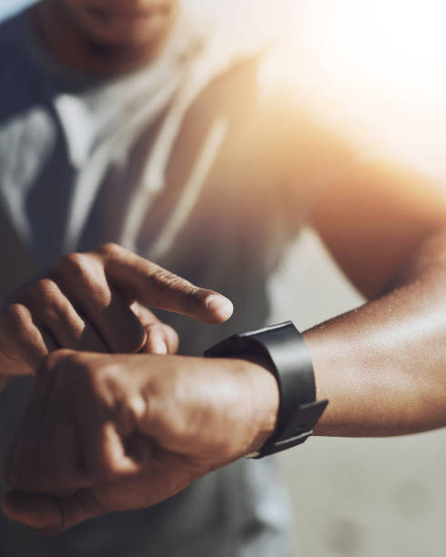 istock Athlete, hands and check smart watch for fitness with progress tracker and performance results for workout. Stopwatch, person and cardio timer to monitor heart rate, running speed and exercise stats 2161914401
