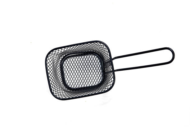 istock empty black wire chip serving basket isolated on white background with clipping path. Stainless steel small frying basket, view from above. Mockup template for food or menu poster 2161914997