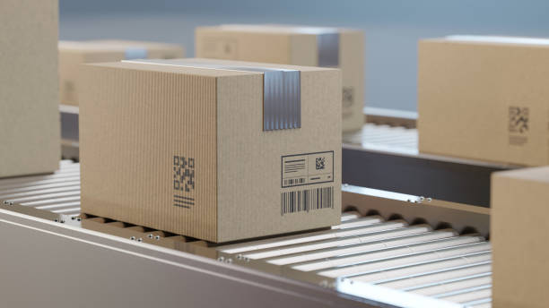 istock Automatic sorting, shipping and transportation concept. Packed boxes on the conveyor belt 2161917483